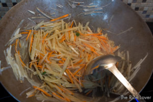 Add carrots when potatoes start to turn translucent