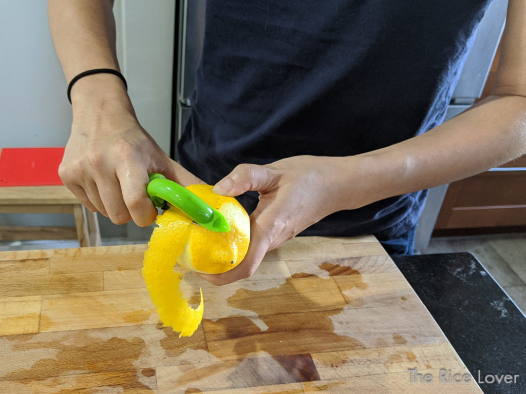 using Messermeister Pro swivel peeler on a lemon