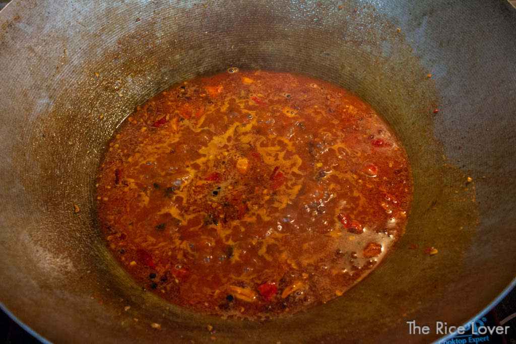 Spicy red beef broth