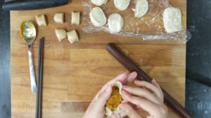 Stuff the laminated pastry dough with pumpkin filling