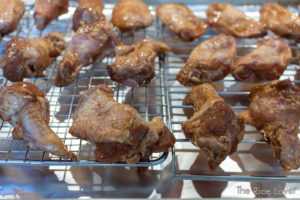 arrange the marinated wings on a baking rack over a rimmed baking sheet